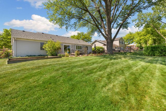 Undisclosed Address Buffalo Grove, IL 60089 - Photo 28 of 30 a front view of house with yard and green space