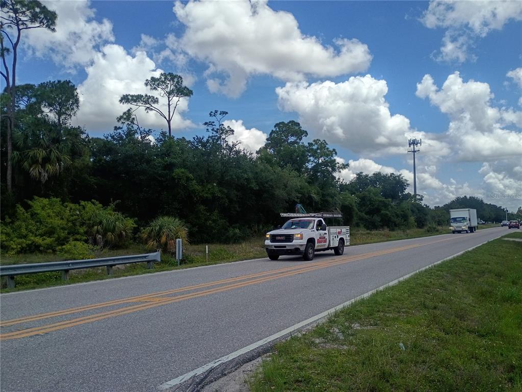 6255 Taylor Road Punta Gorda, FL 33950 - Photo 1 of 6 a car parked on the side of the road