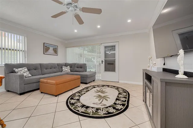 a living room with furniture and a table