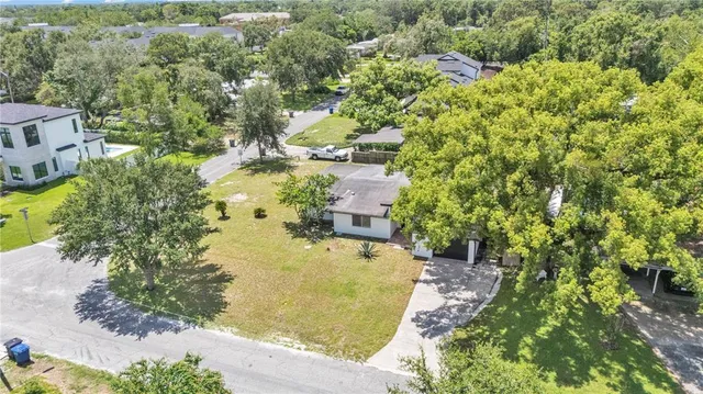 an aerial view of residential house with outdoor space
