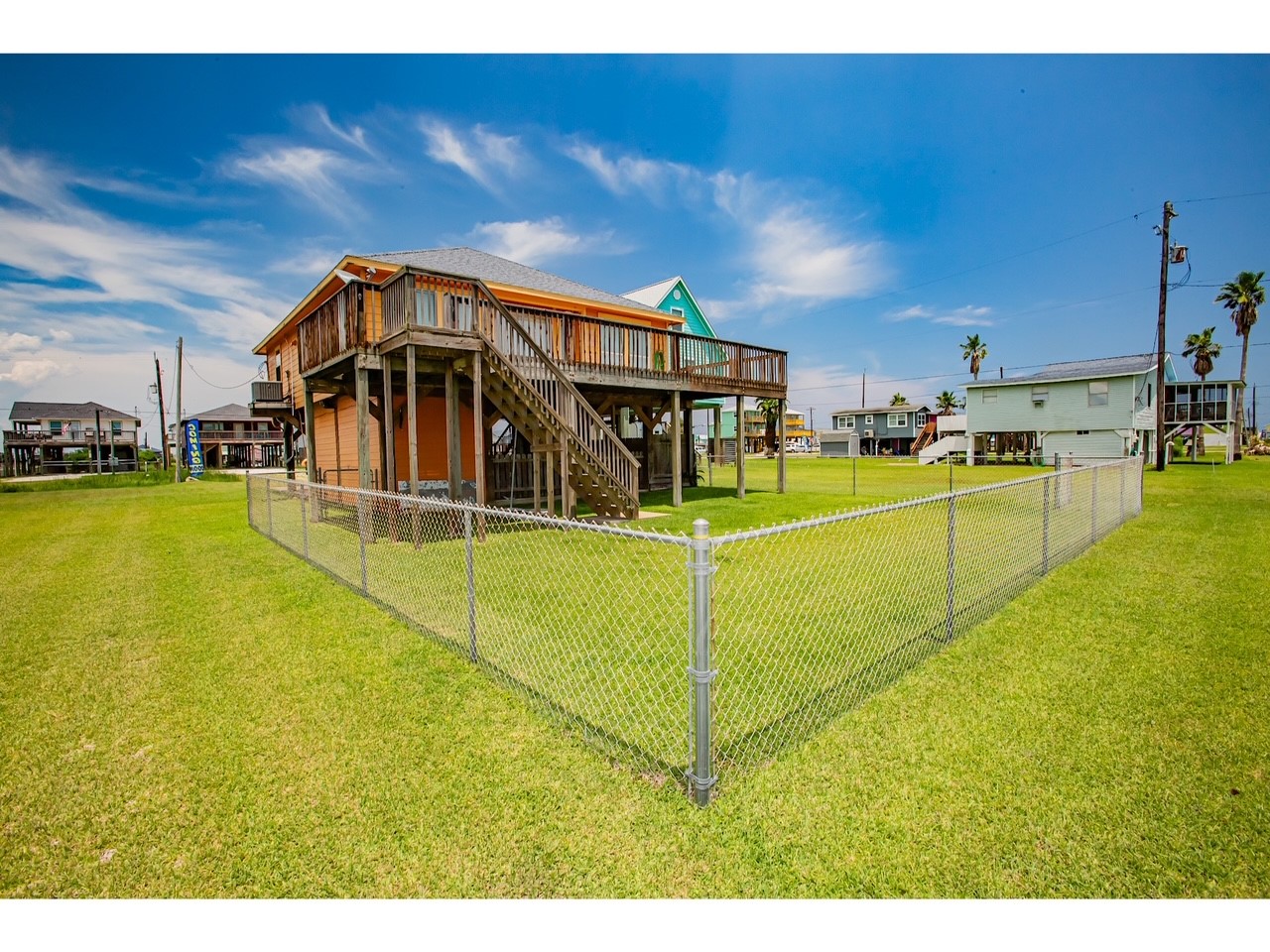 419 Thunder Road Surfside Beach, TX 77541 - Photo 4 of 32 This home features a spacious, secure fenced yard.