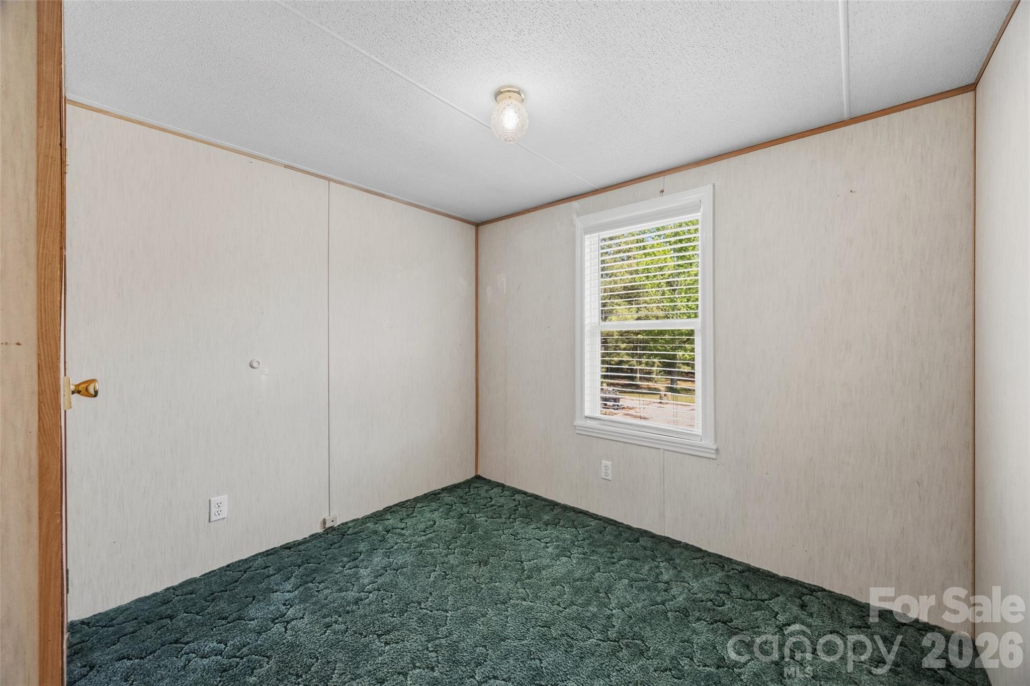 821 Nancys Place Chester, SC 29706 - Photo 11 of 26 a view of an empty room with a window