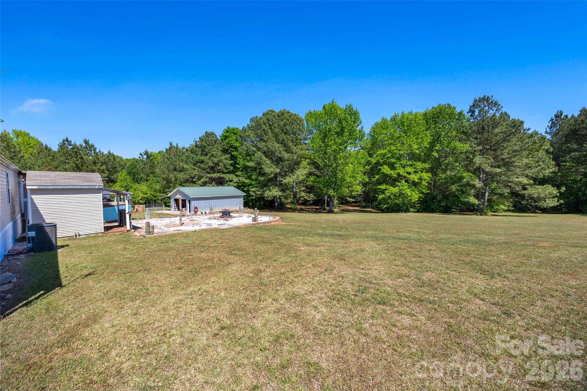 821 Nancys Place Chester, SC 29706 - Photo 18 of 26 a backyard of a house with lots of green space