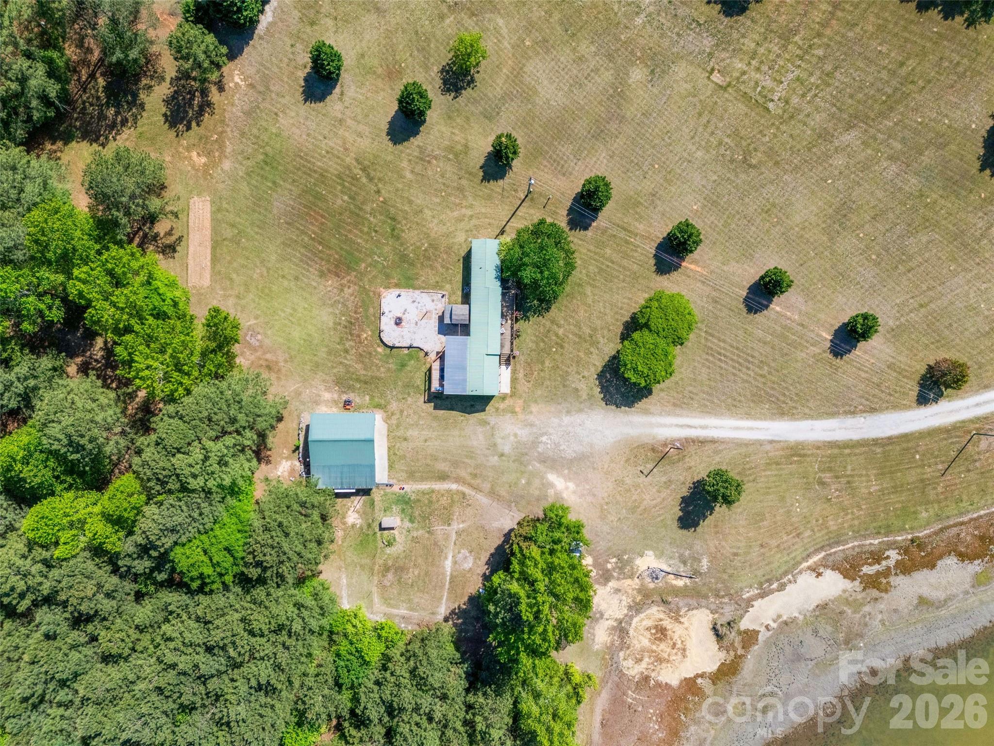 821 Nancys Place Chester, SC 29706 - Photo 23 of 26 an aerial view of a house with a yard and sitting area