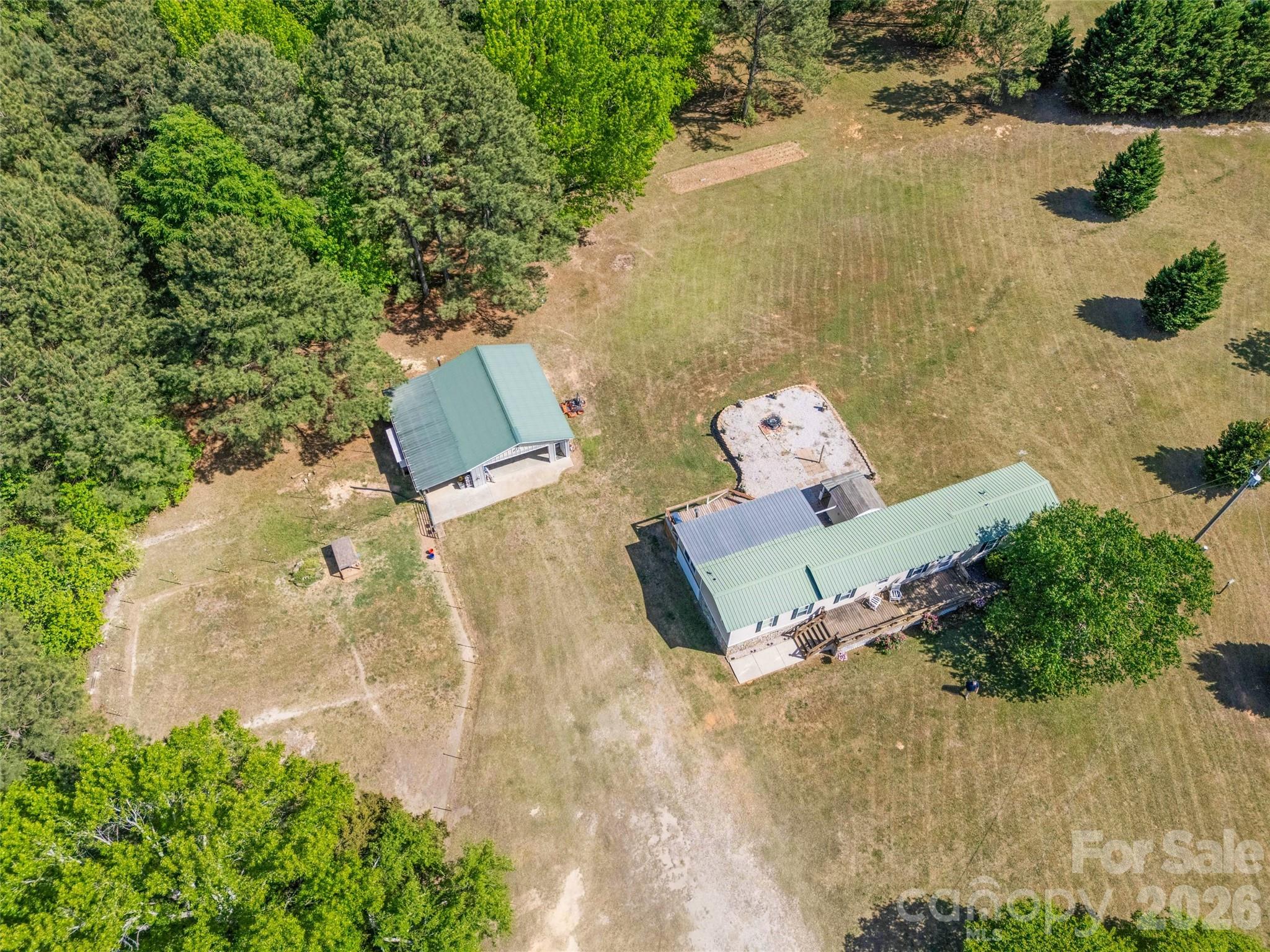 821 Nancys Place Chester, SC 29706 - Photo 24 of 26 an aerial view of a house with a yard and lake view