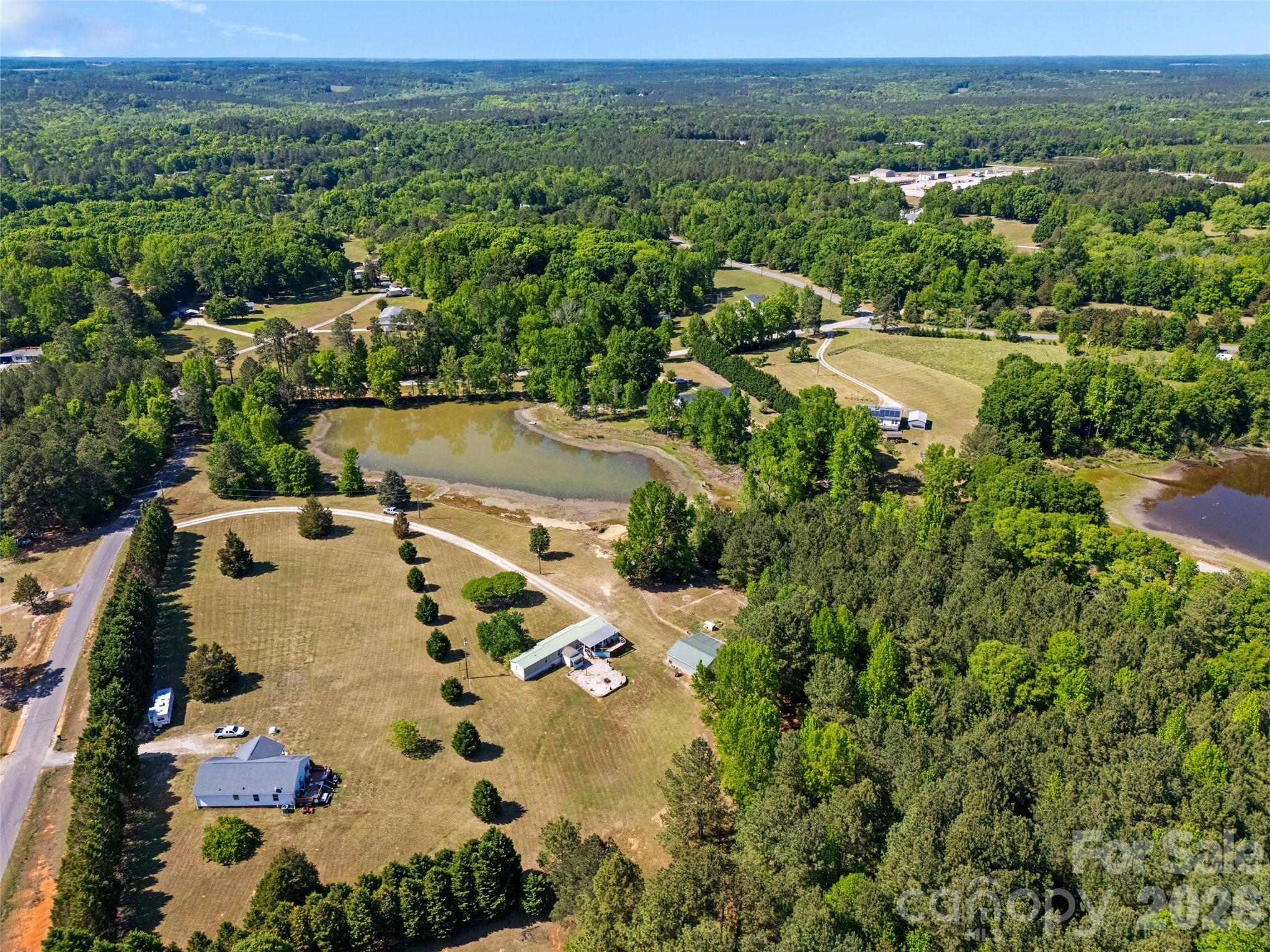 821 Nancys Place Chester, SC 29706 - Photo 25 of 26 an aerial view of residential houses with outdoor space and trees