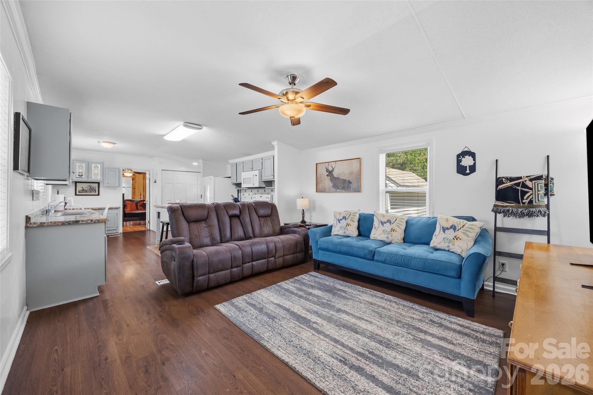 821 Nancys Place Chester, SC 29706 - Photo 3 of 26 a living room with furniture and a wooden floor
