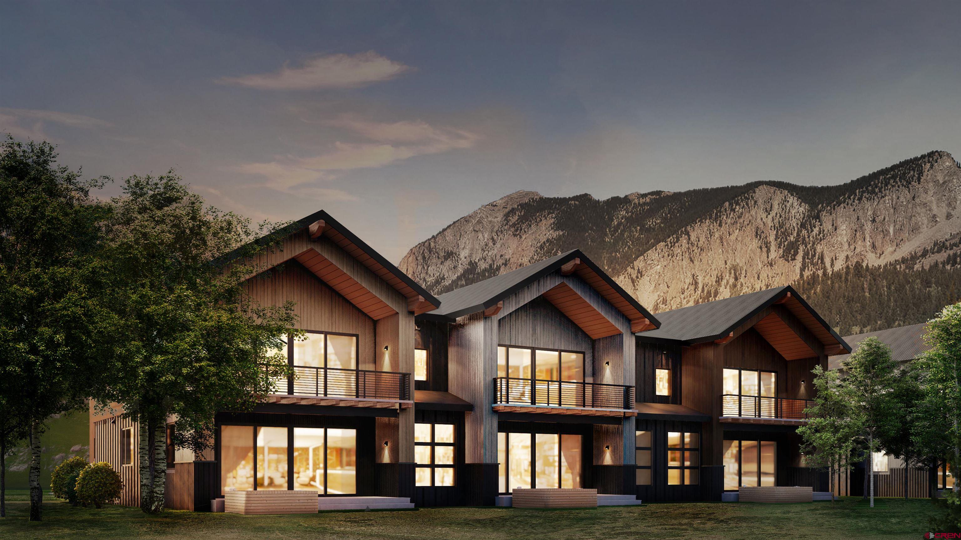 180 Elk Valley Road, Unit 105 Crested Butte, CO 81224 - Photo 25 of 35 a front view of a house with a yard