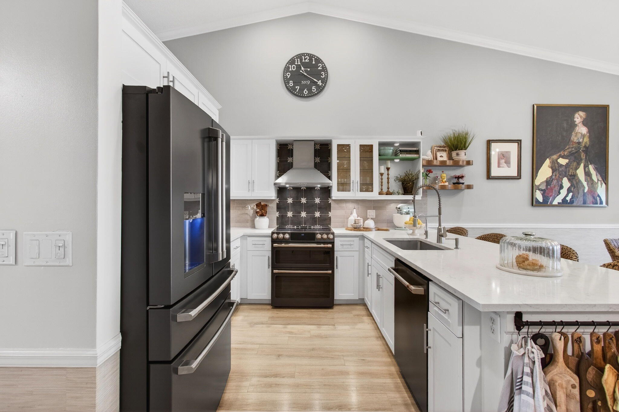 21400 Millbrook Court Boca Raton, FL 33498 - Photo 14 of 65 a kitchen with stainless steel appliances granite countertop a stove and a refrigerator