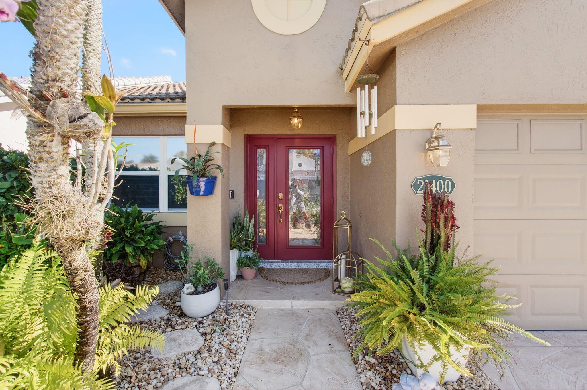 21400 Millbrook Court Boca Raton, FL 33498 - Photo 2 of 65 a front view of a house