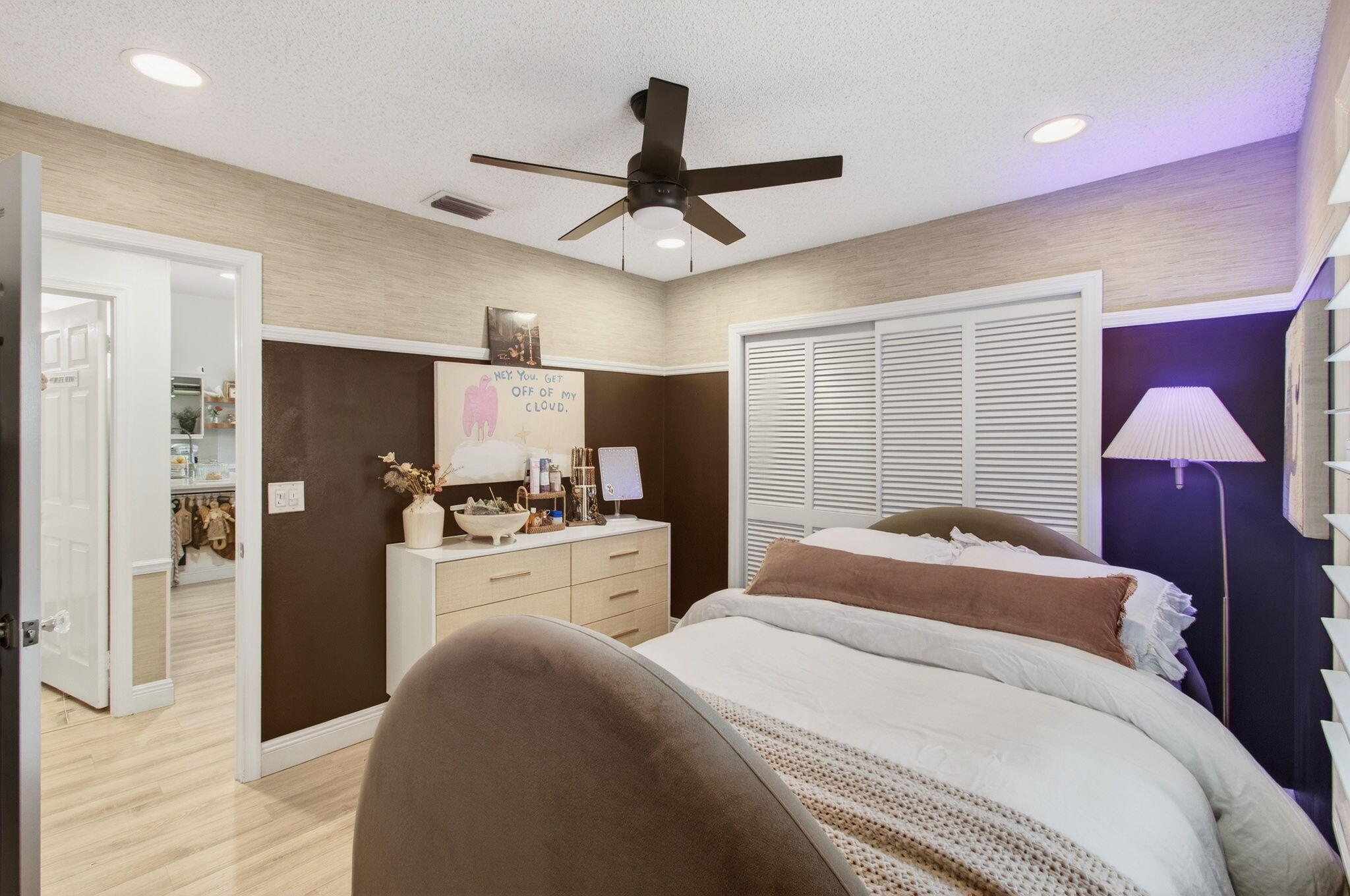 21400 Millbrook Court Boca Raton, FL 33498 - Photo 31 of 65 a bedroom with a bed and a chandelier