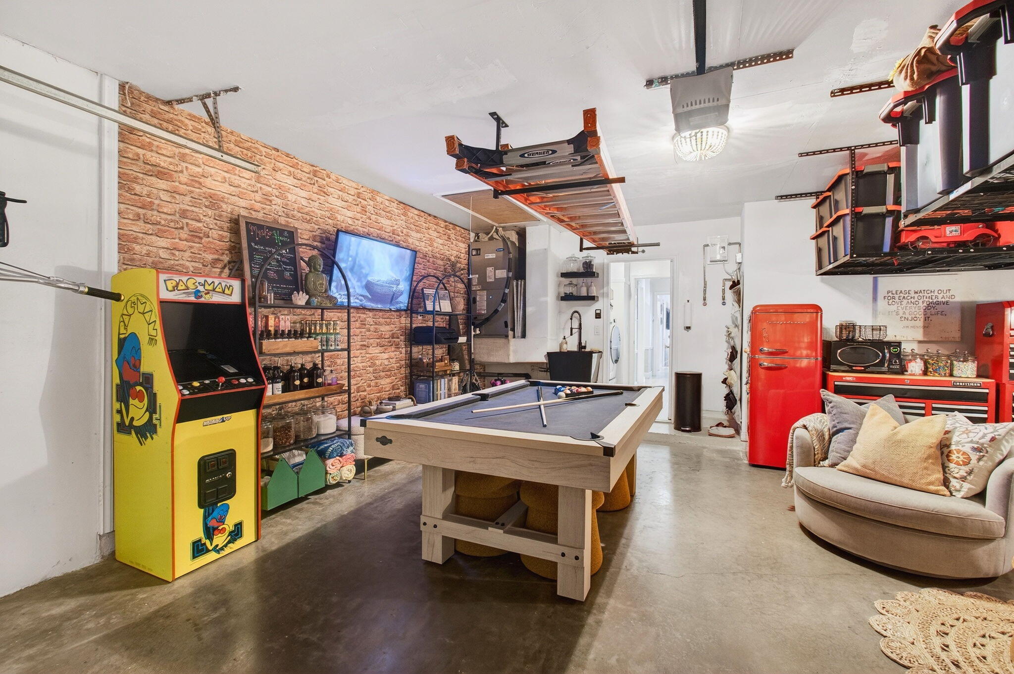 21400 Millbrook Court Boca Raton, FL 33498 - Photo 45 of 65 a living room with furniture and a flat screen tv