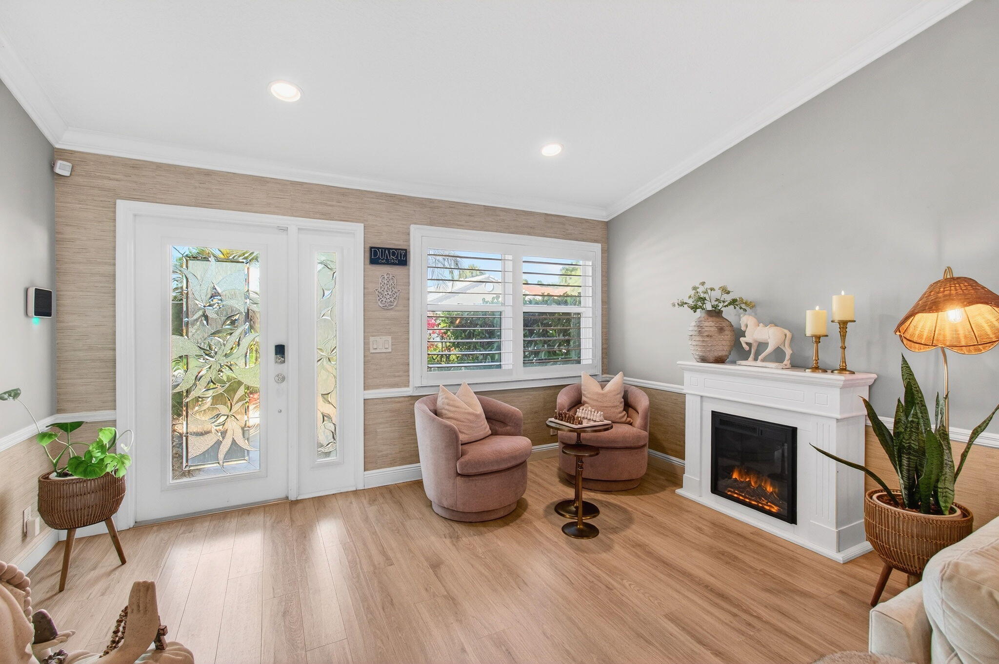 21400 Millbrook Court Boca Raton, FL 33498 - Photo 8 of 65 a living room with furniture a window and a fireplace