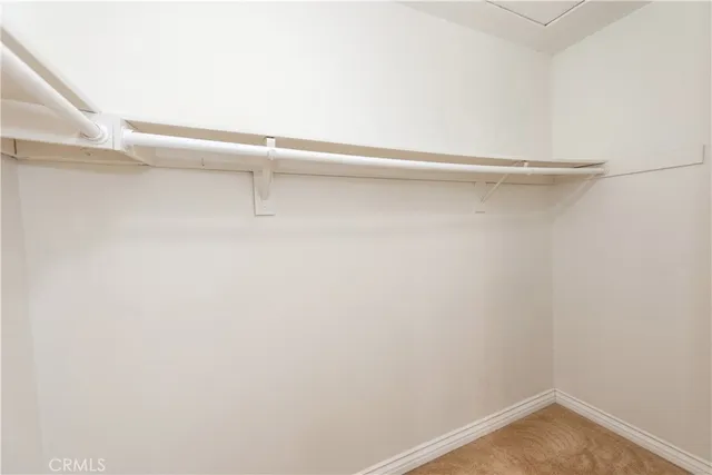 a view of a room with racks on the wall