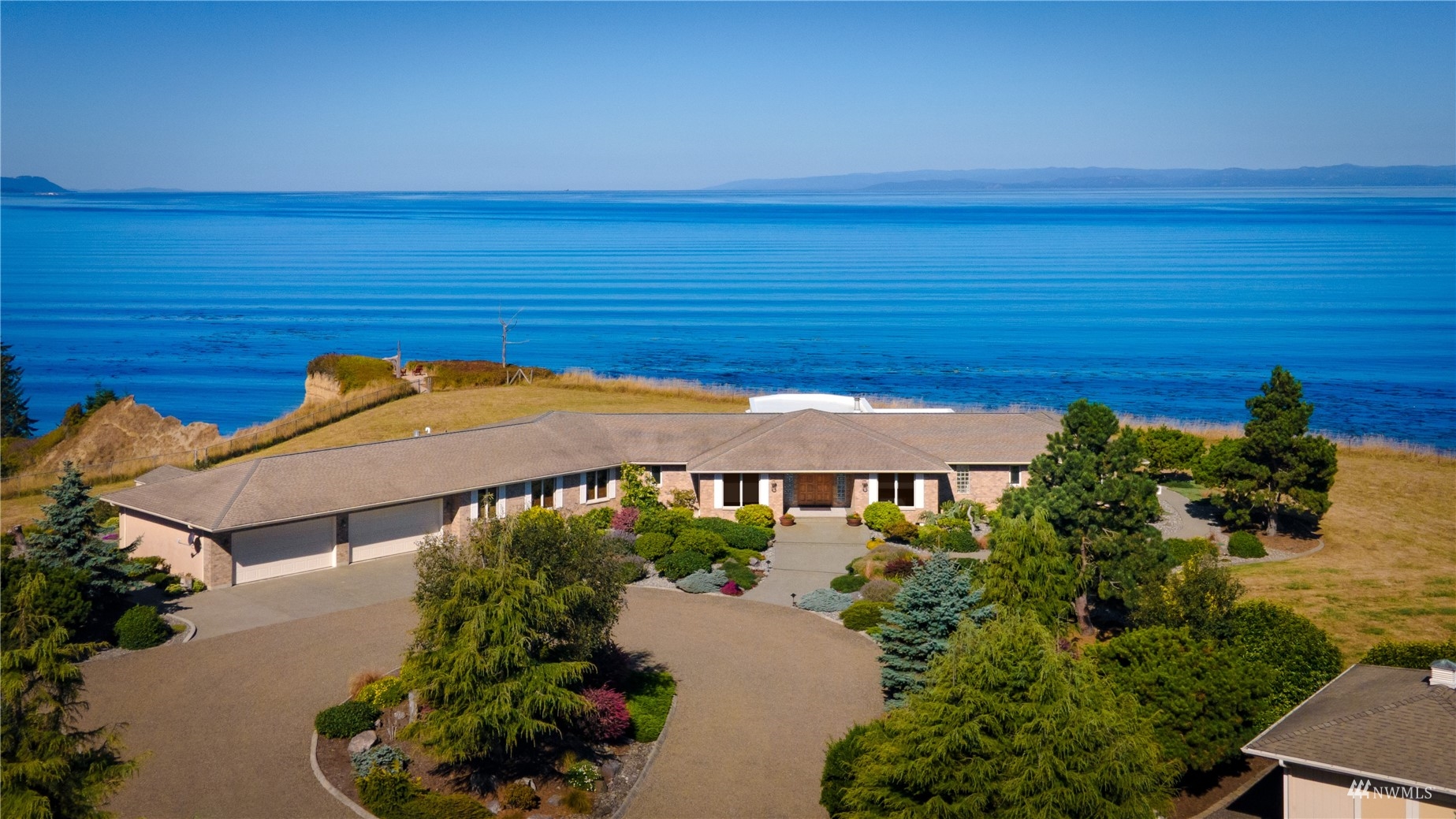 front view of a house with a ocean view