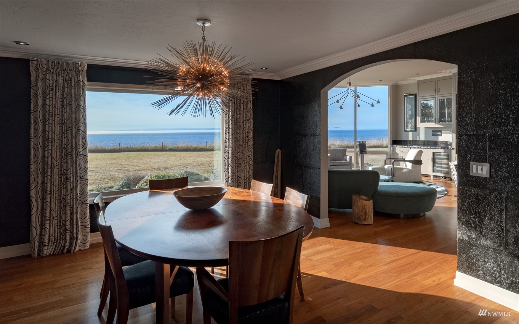 213 Mariners Point Road Sequim, WA 98382 - Photo 11 of 40 a view of a dining room with furniture and window
