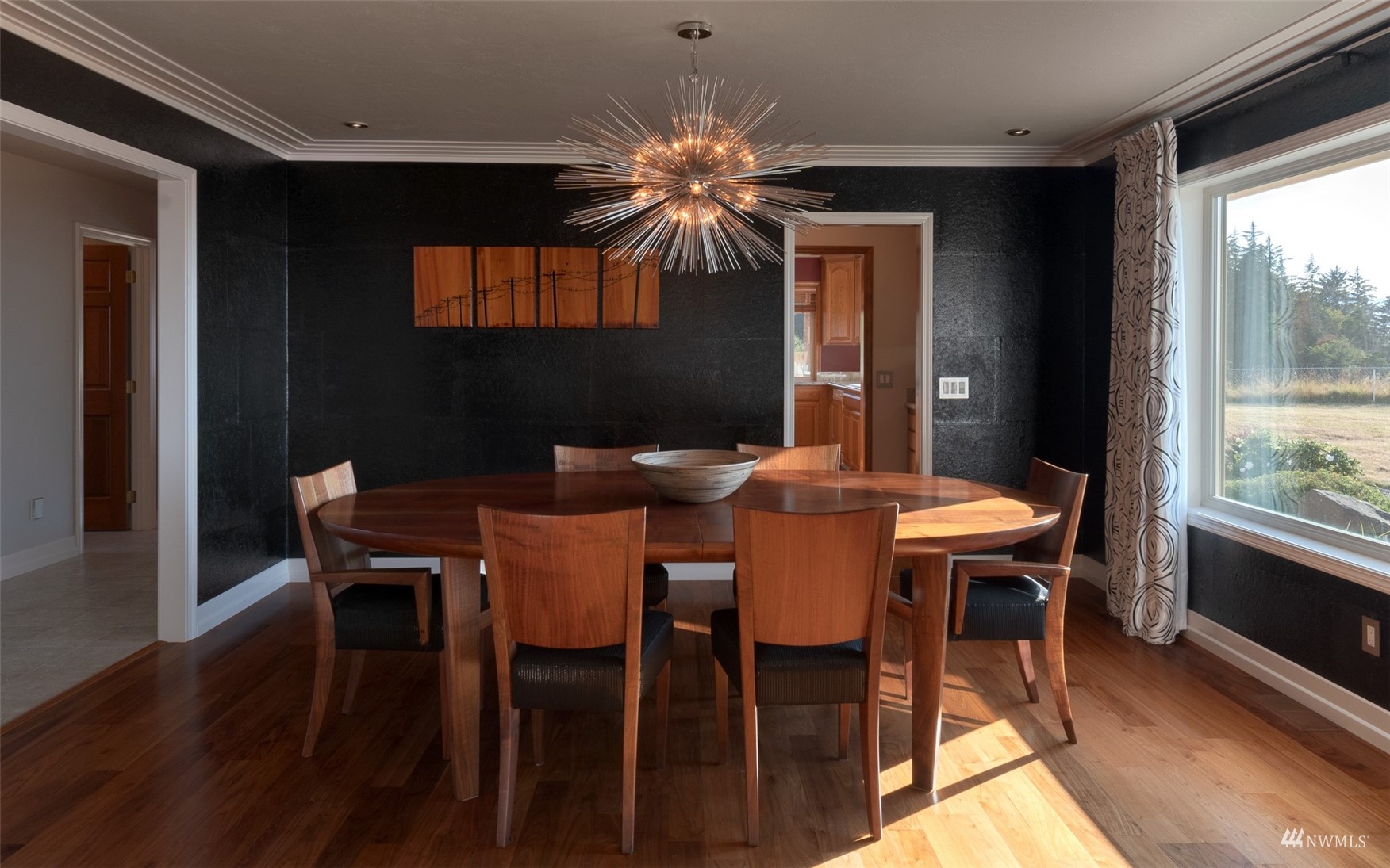 213 Mariners Point Road Sequim, WA 98382 - Photo 12 of 40 a dining room with furniture and window