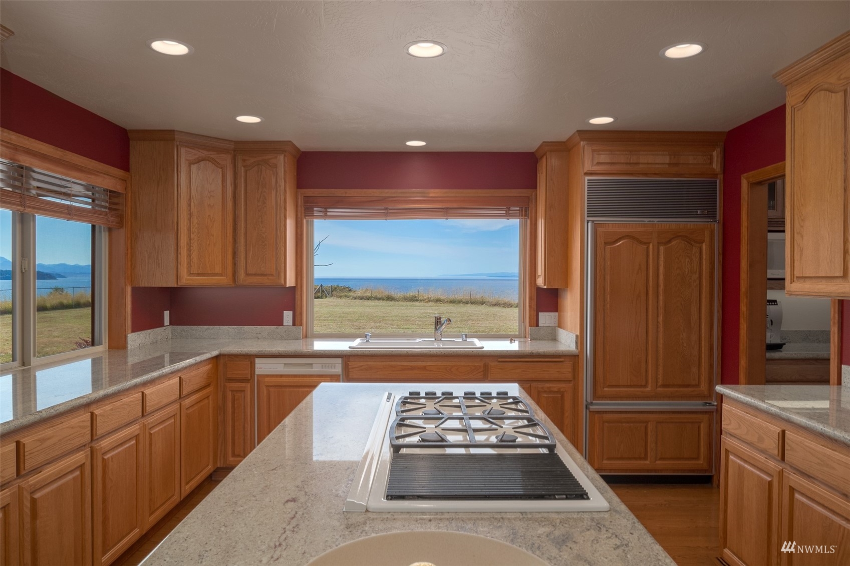 213 Mariners Point Road Sequim, WA 98382 - Photo 14 of 40 a kitchen with a sink stove and refrigerator