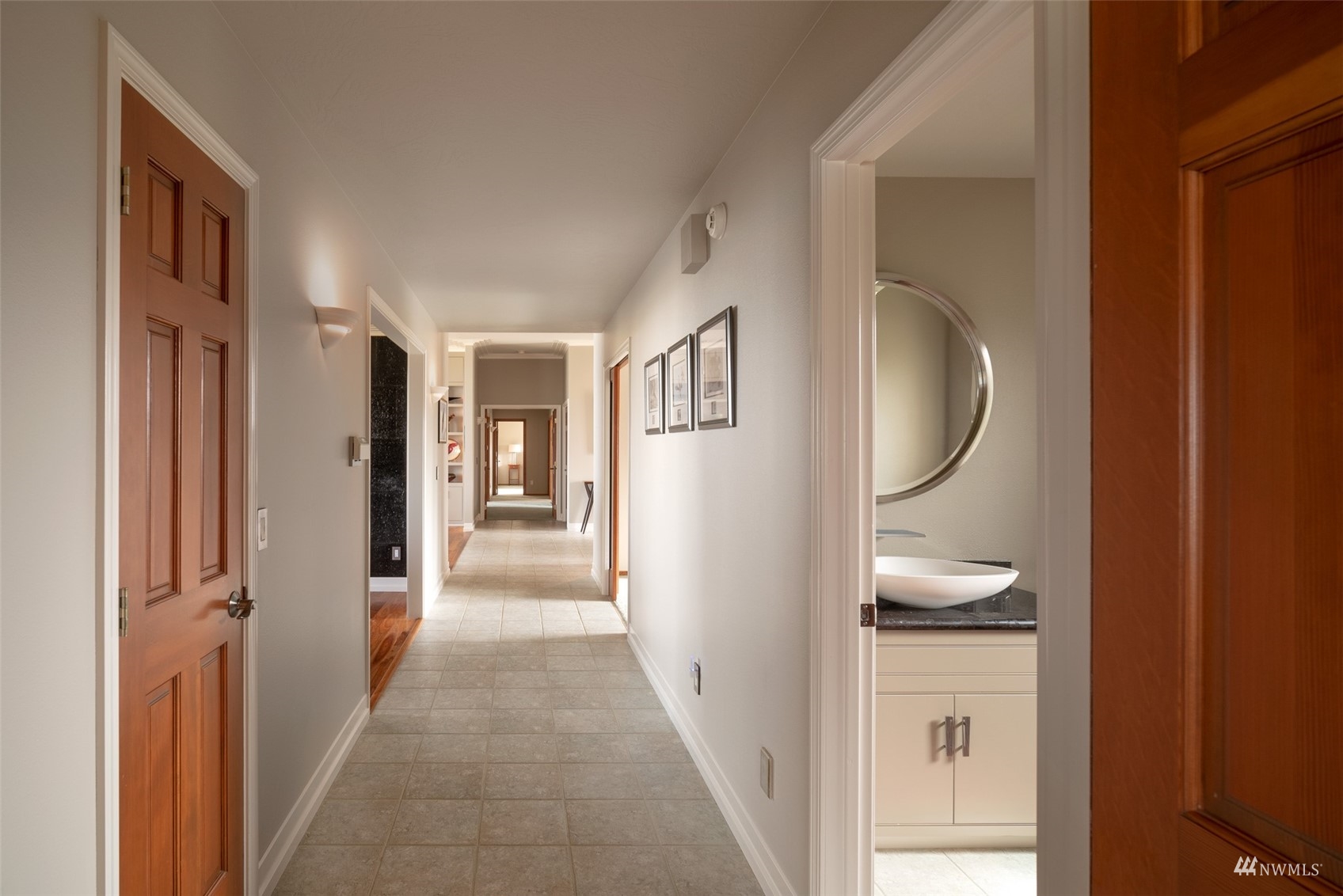 213 Mariners Point Road Sequim, WA 98382 - Photo 19 of 40 a view of a hallway with wooden floor windows and entryway