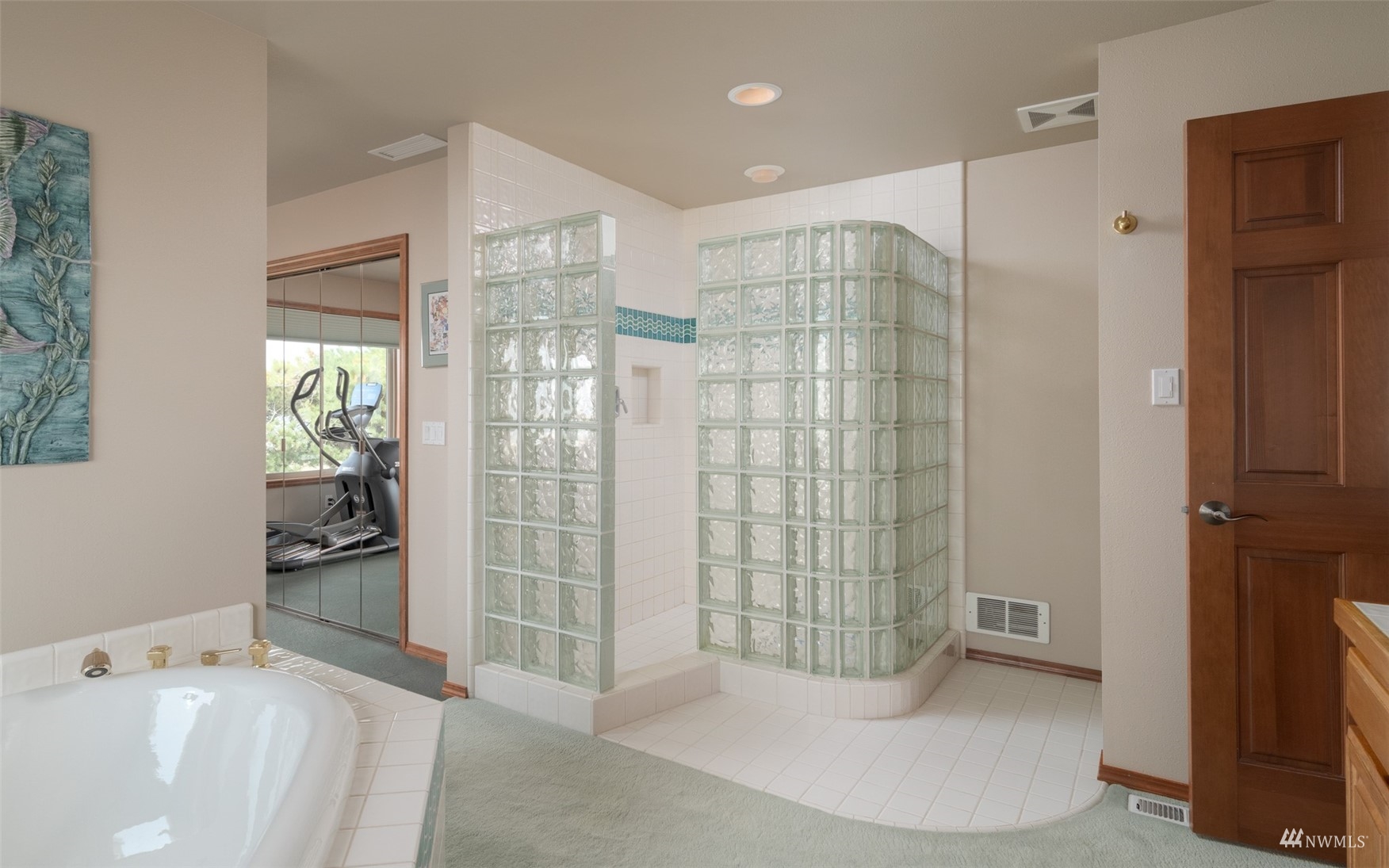 213 Mariners Point Road Sequim, WA 98382 - Photo 25 of 40 a bathroom with a shower and a tub