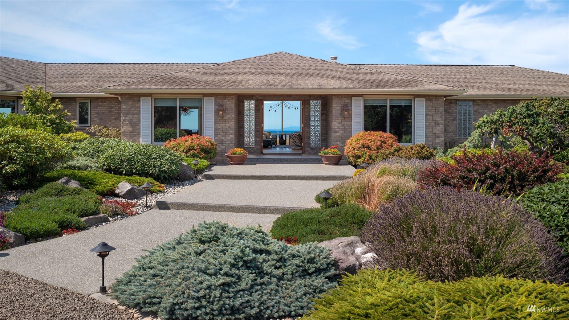 213 Mariners Point Road Sequim, WA 98382 - Photo 3 of 40 front view of a house with a yard