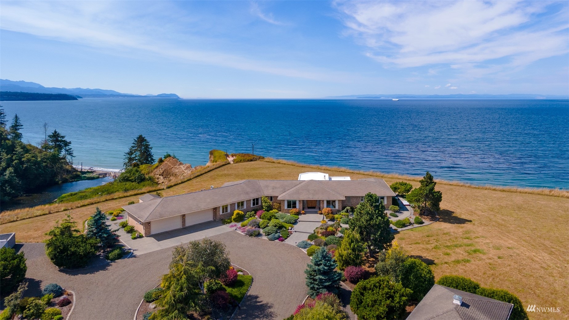 213 Mariners Point Road Sequim, WA 98382 - Photo 36 of 40 an aerial view of ocean and residential houses with outdoor space