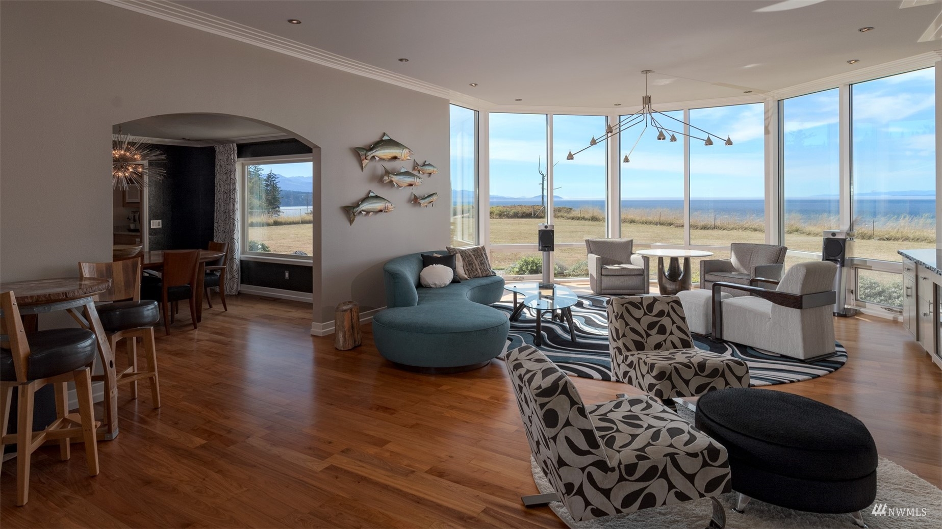 213 Mariners Point Road Sequim, WA 98382 - Photo 10 of 40 a living room with furniture and large windows
