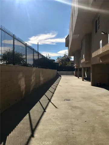 a view of balcony with furniture