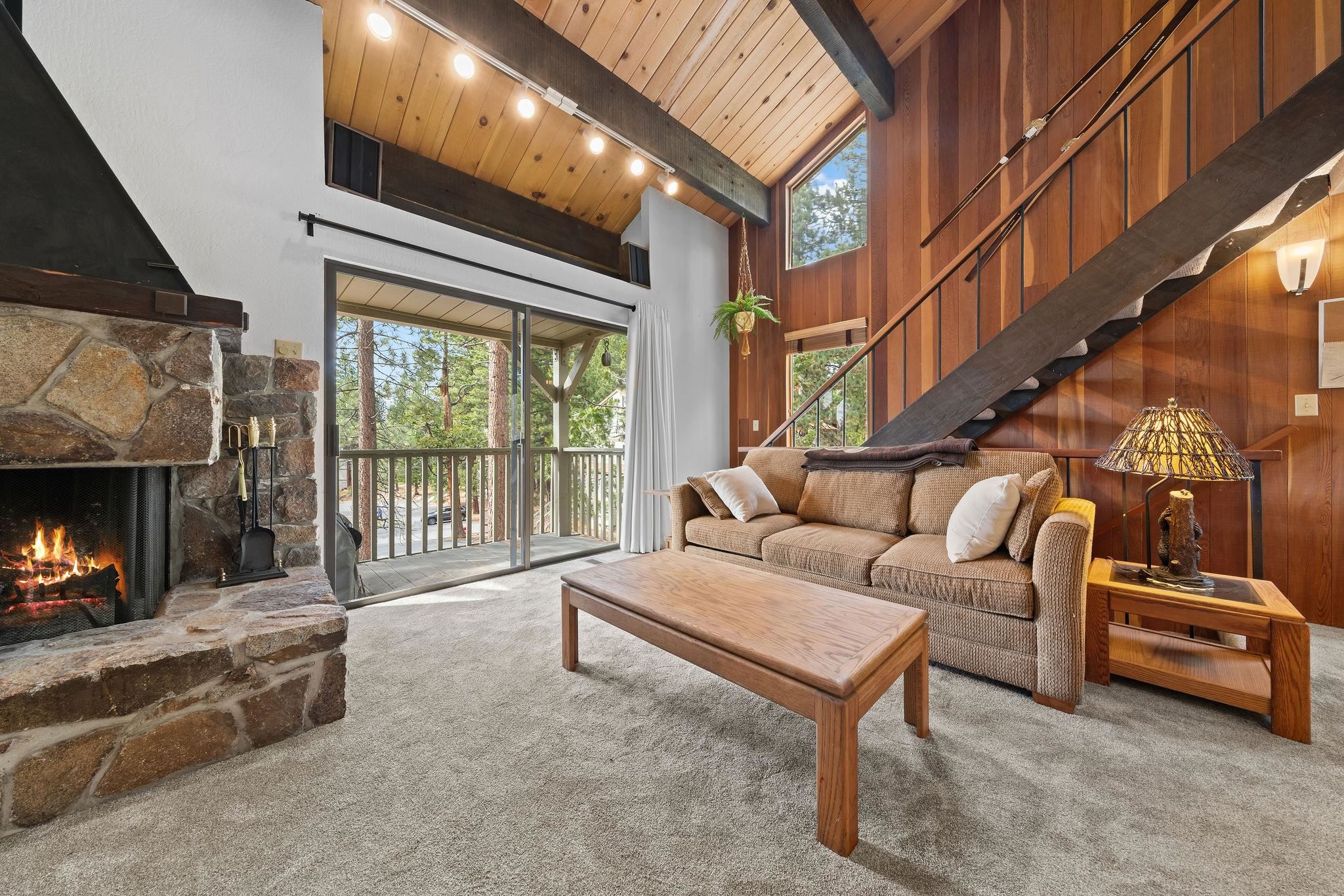 1001 Commonwealth Drive, Unit 206 Kings Beach, CA 96143 - Photo 2 of 28 a balcony with furniture and a fireplace