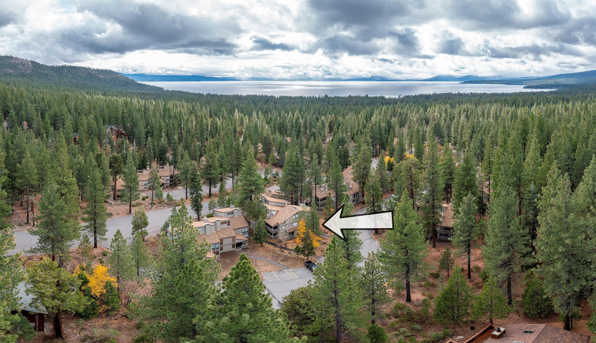 1001 Commonwealth Drive, Unit 206 Kings Beach, CA 96143 - Photo 26 of 28 a view of a lake with a yard