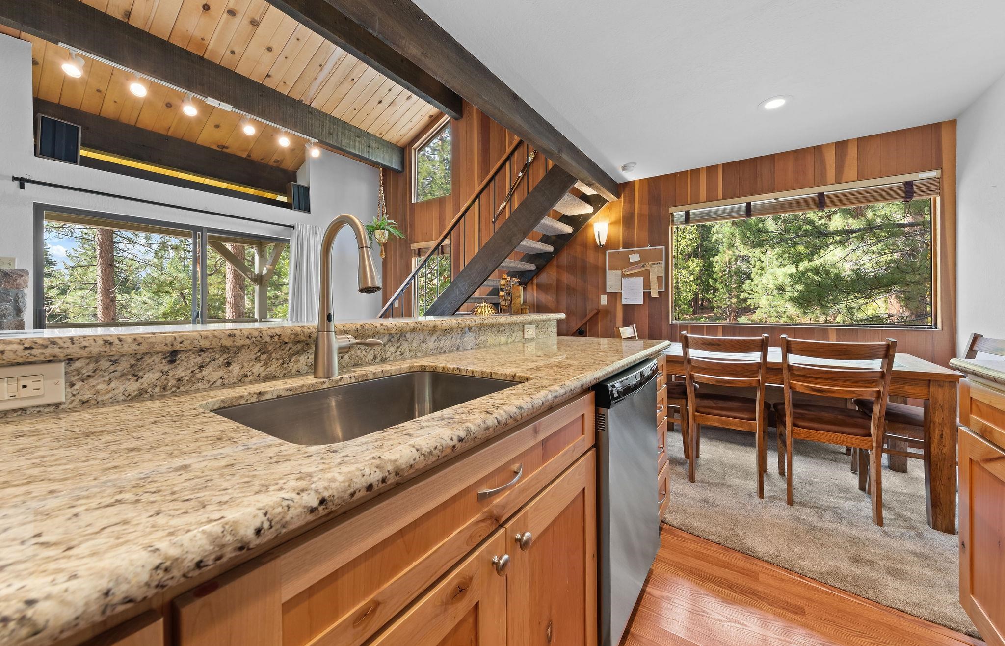 1001 Commonwealth Drive, Unit 206 Kings Beach, CA 96143 - Photo 7 of 28 a kitchen with a sink and a large window