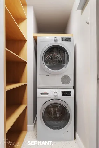 a utility room with dryer and washer