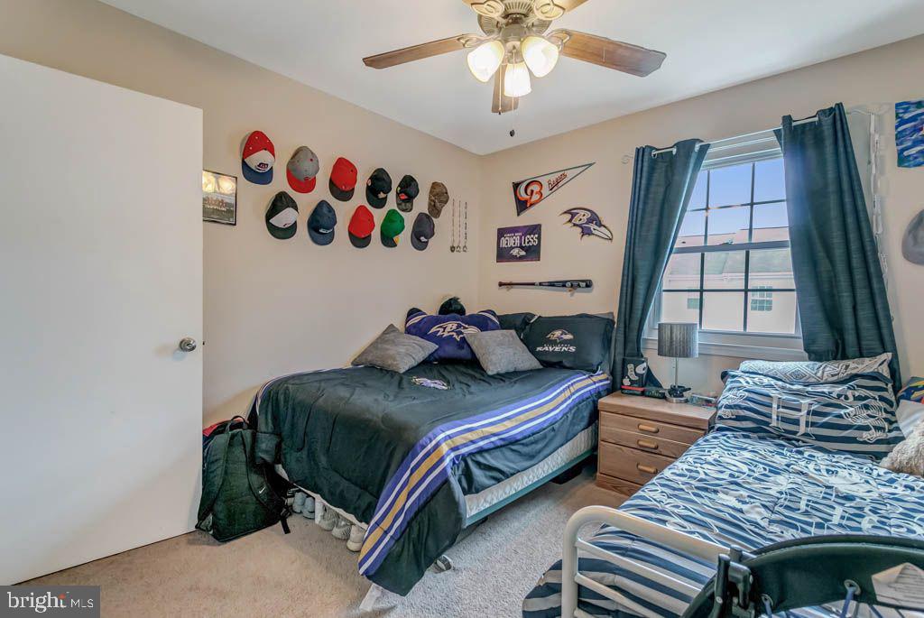 1677 Brice Court Crofton, MD 21114 - Photo 27 of 34 a bedroom with two beds and a window