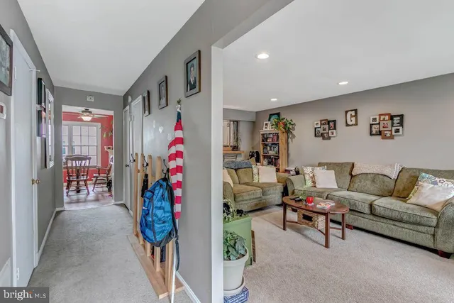 a living room with furniture and toys