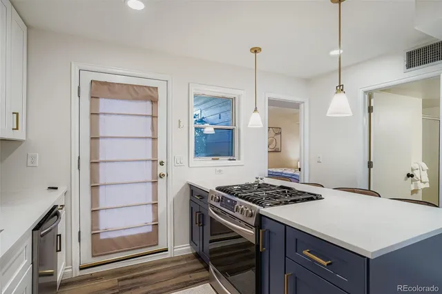 a bedroom with a bed and glass window
