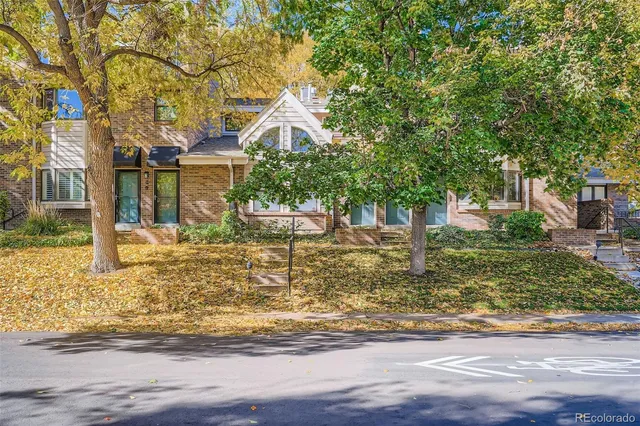 front view of a house with a chairs