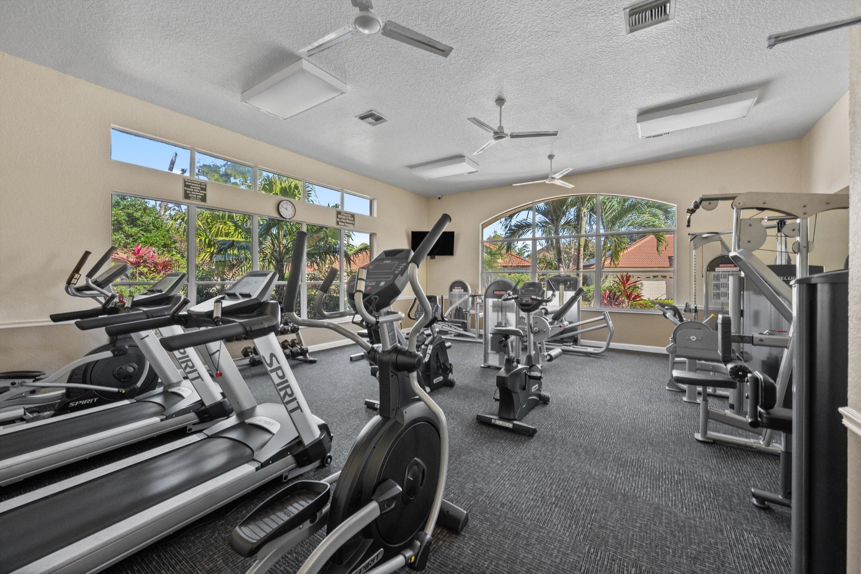 6058 Seminole Gardens Circle Riviera Beach, FL 33418 - Photo 39 of 47 a view of a room with gym equipment