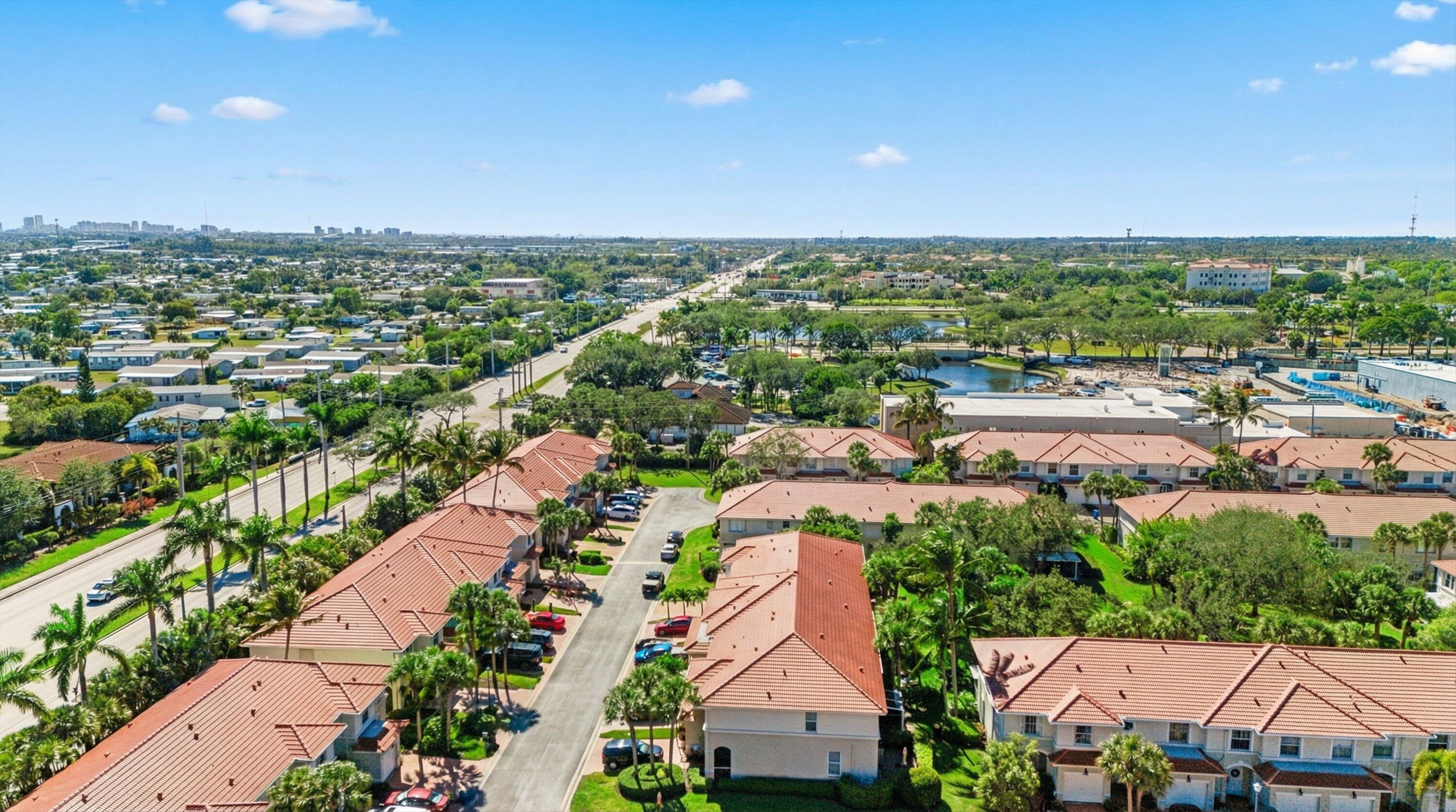 6058 Seminole Gardens Circle Riviera Beach, FL 33418 - Photo 45 of 47 an aerial view of a city