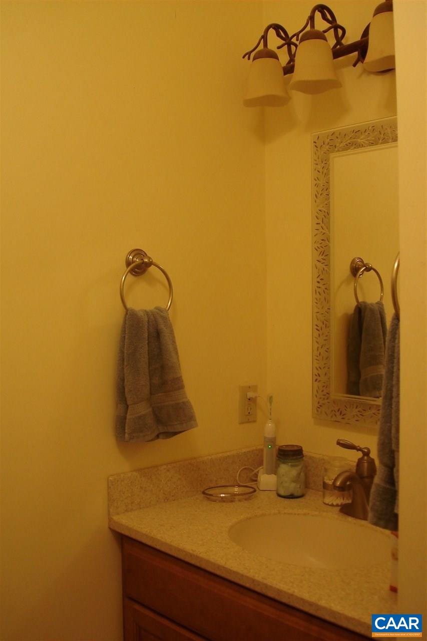 470 Long Branch Road Amherst, VA 24521 - Photo 28 of 30 a bathroom with a granite countertop sink and a mirror