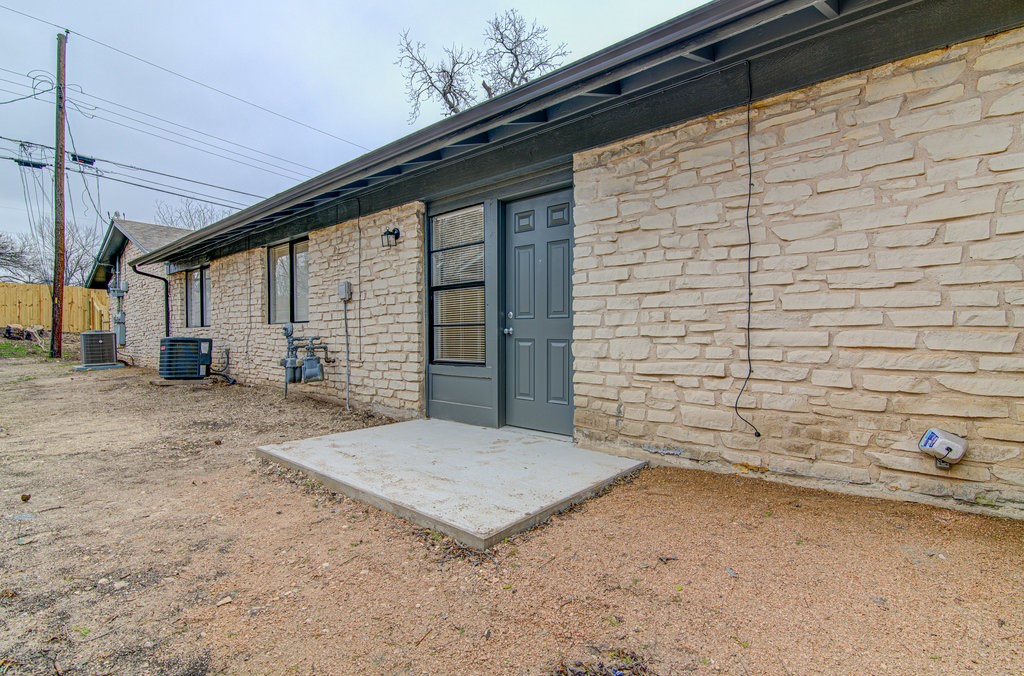 5703 Gloucester Lane, Unit A Austin, TX 78723 - Photo 11 of 11 a view of a backyard of the house