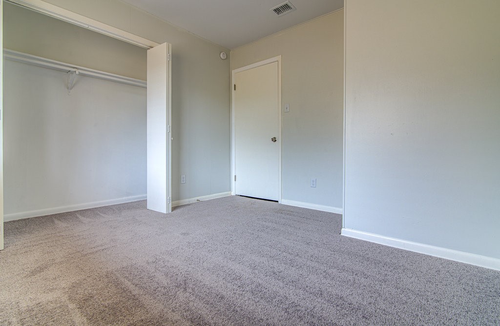 5703 Gloucester Lane, Unit A Austin, TX 78723 - Photo 6 of 11 a view of an empty room