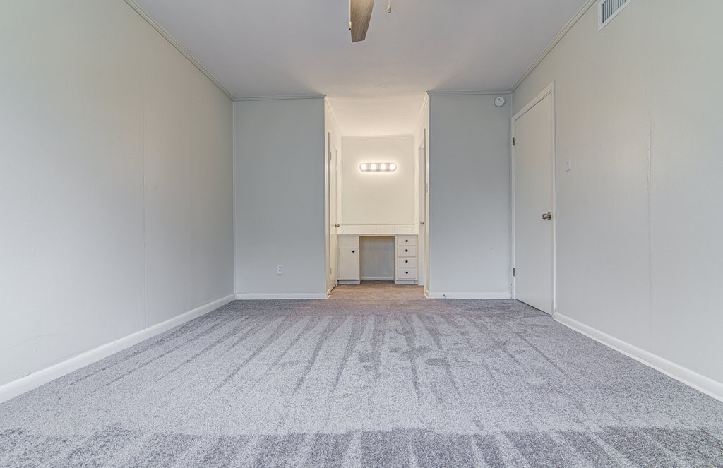 5703 Gloucester Lane, Unit A Austin, TX 78723 - Photo 9 of 11 a view of empty room with wooden floor
