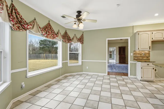 a view of a entryway in a hall with a window