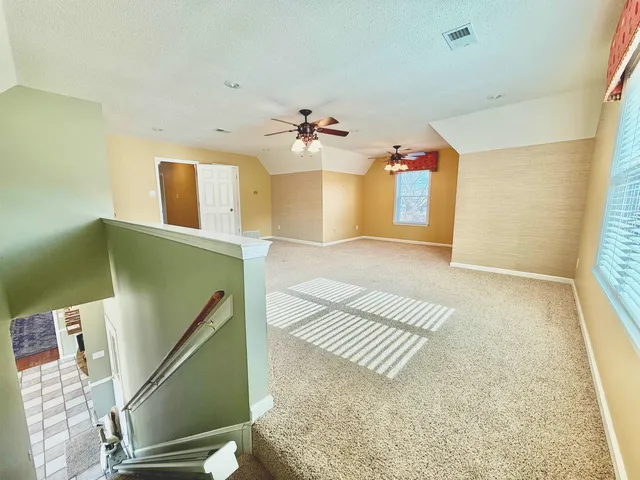 a view of swimming pool with an outdoor space and seating area