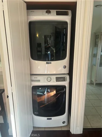 a utility room with washing machine