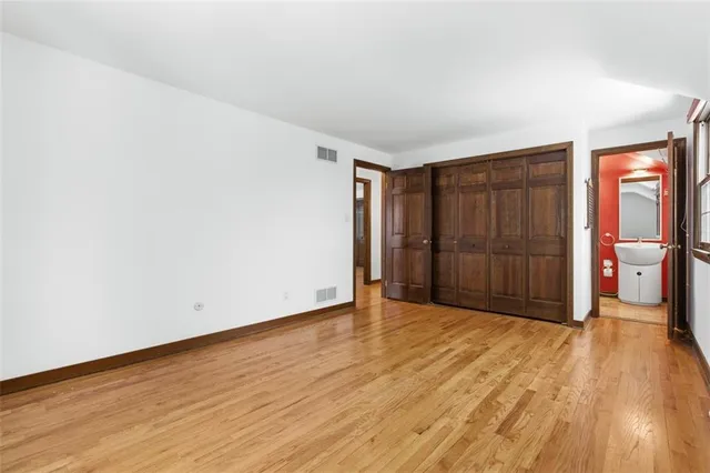 a view of entryway with wooden floor