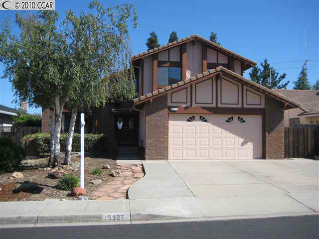 5327 Paso Del Rio Way Concord, CA 94521 - Photo 1 of 1 a front view of a house with garage