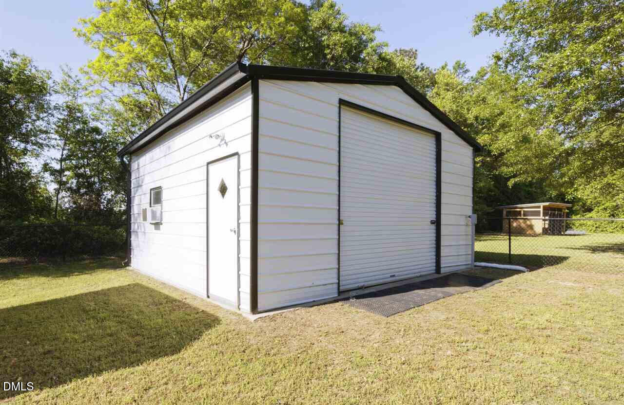 61 Shepherd Drive Benson, NC 27504 - Photo 32 of 32 61 Shepherd Garage
