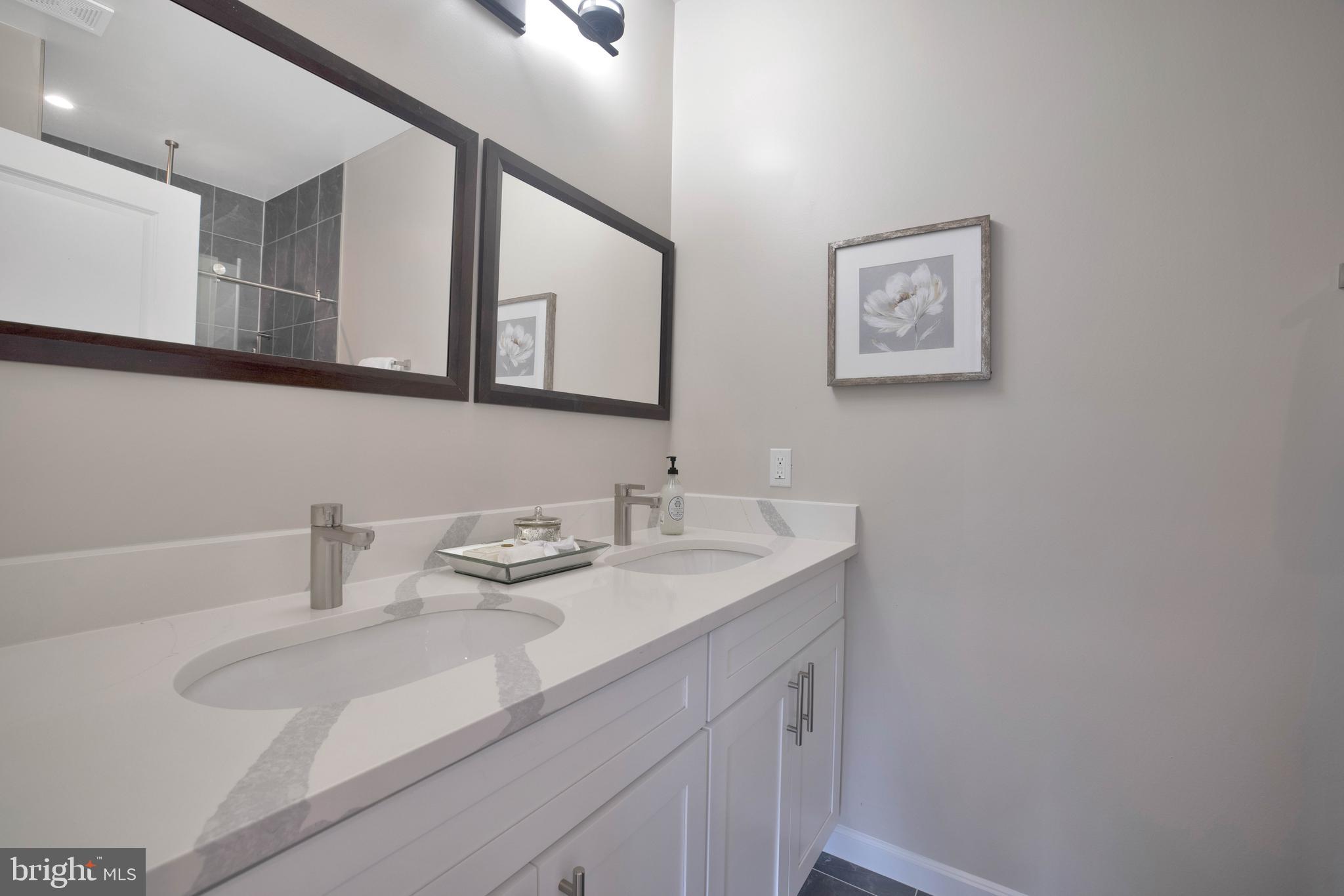 2415 Elvans Road Southeast Washington, DC 20020 - Photo 34 of 47 double vanity en-suite bath w/ Quartz countertops