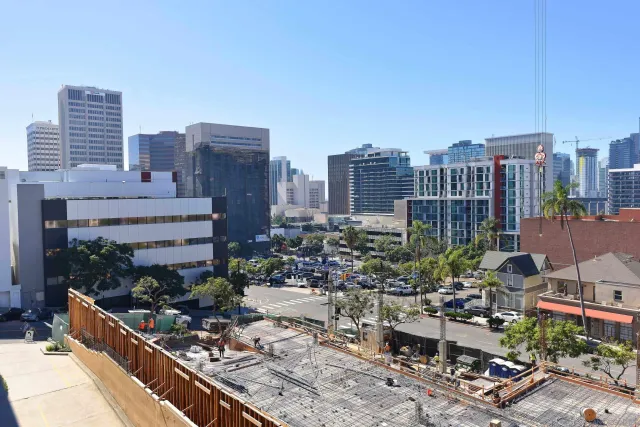 a view of a city with tall buildings